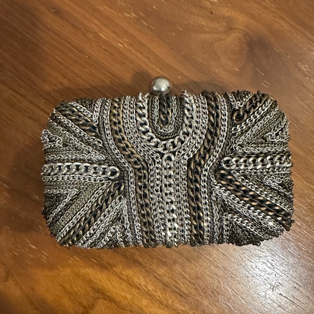 Brand New with Tags, Super Trendy and Chic Multi Chain Covered Clutch